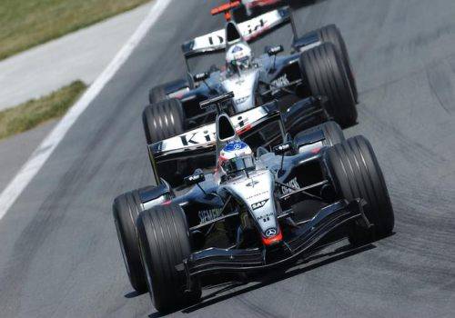 S Davidem Coulthardem strávil Kimi u McLarenu tři sezóny