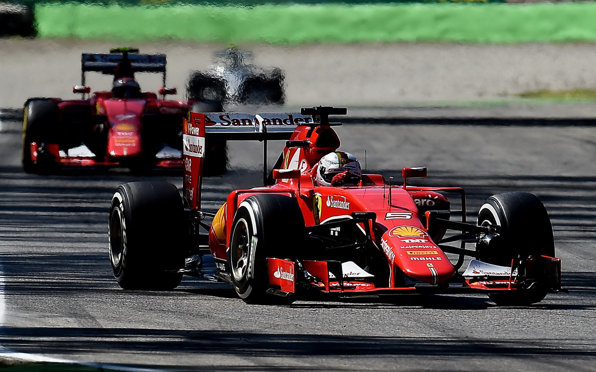 Sebastian Vettel před Kimim Räikkönenem, GP Itálie (Monza)