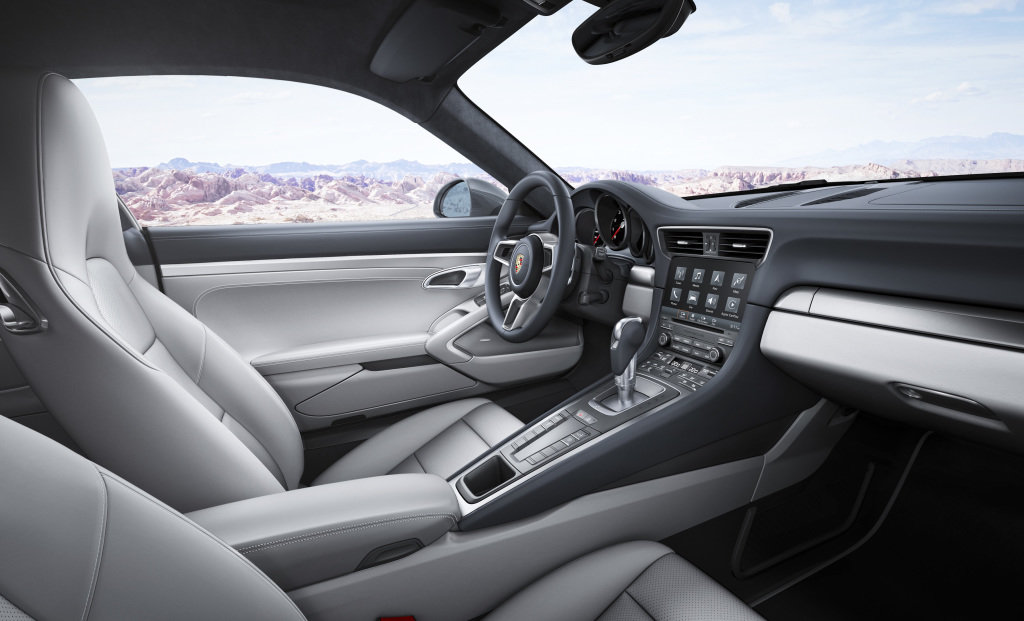 Nový multimediální systém i volant, omlazené Porsche 911.