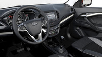 Interiér je moderní, přehledný a jednotlivé knoflíky lze ovládat i v rukavicích, Lada Vesta.