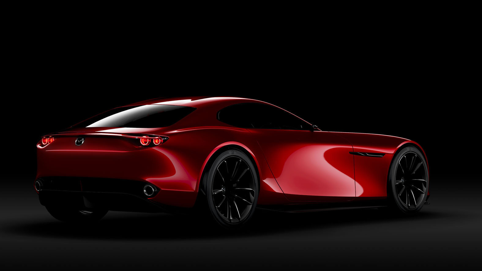 Červená s černými koly vozu nebezpečně sluší, Mazda RX-Vision.