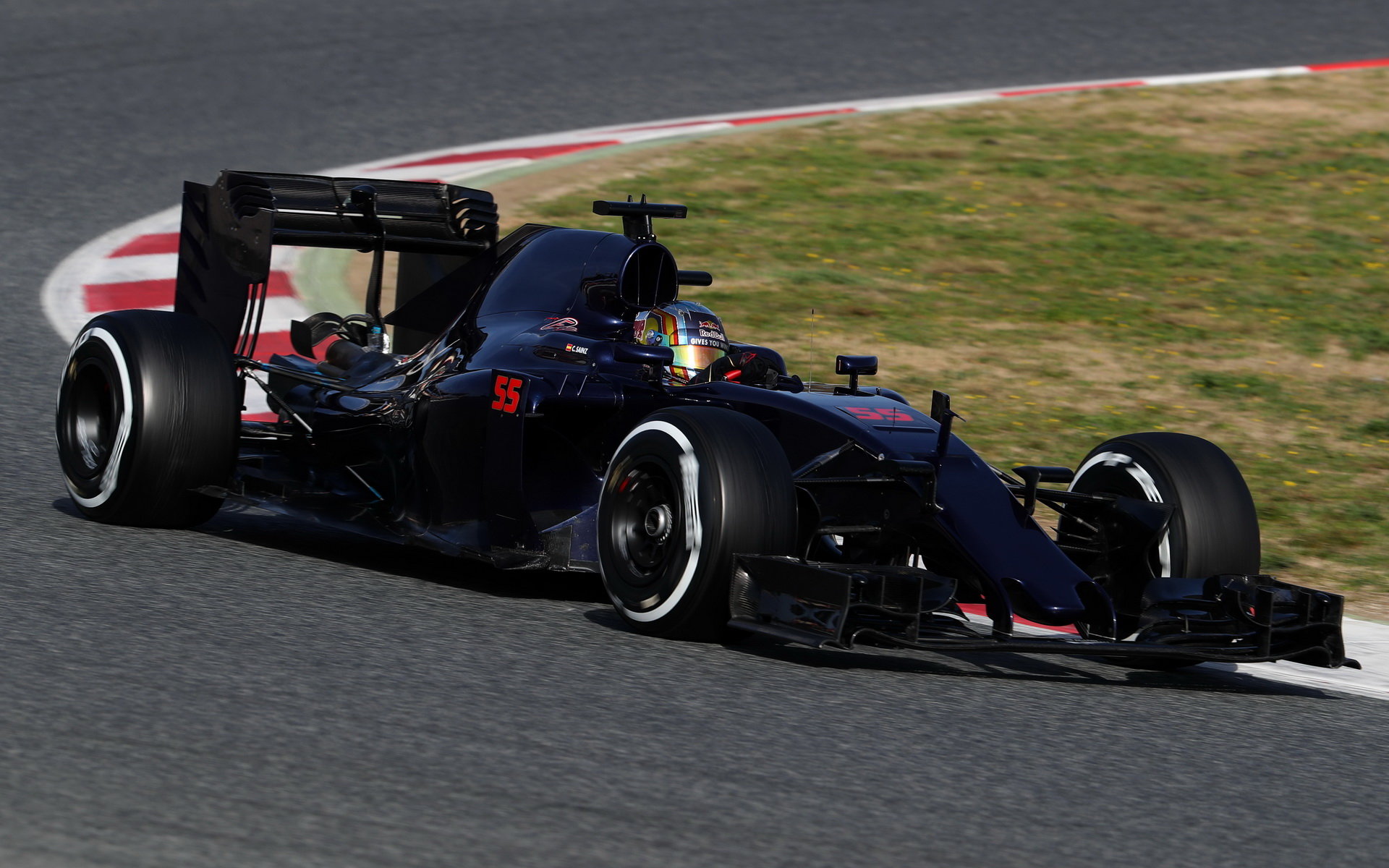 Carlos Sainz s novým vozem Toro Rosso STR11 - Ferrari
