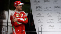Sebastian Vettel na pódiu po závodě v Kanadě