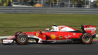Kimi Räikkönen v závodě v Malajsii