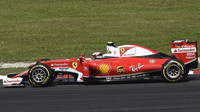Kimi Räikkönen v závodě v Malajsii