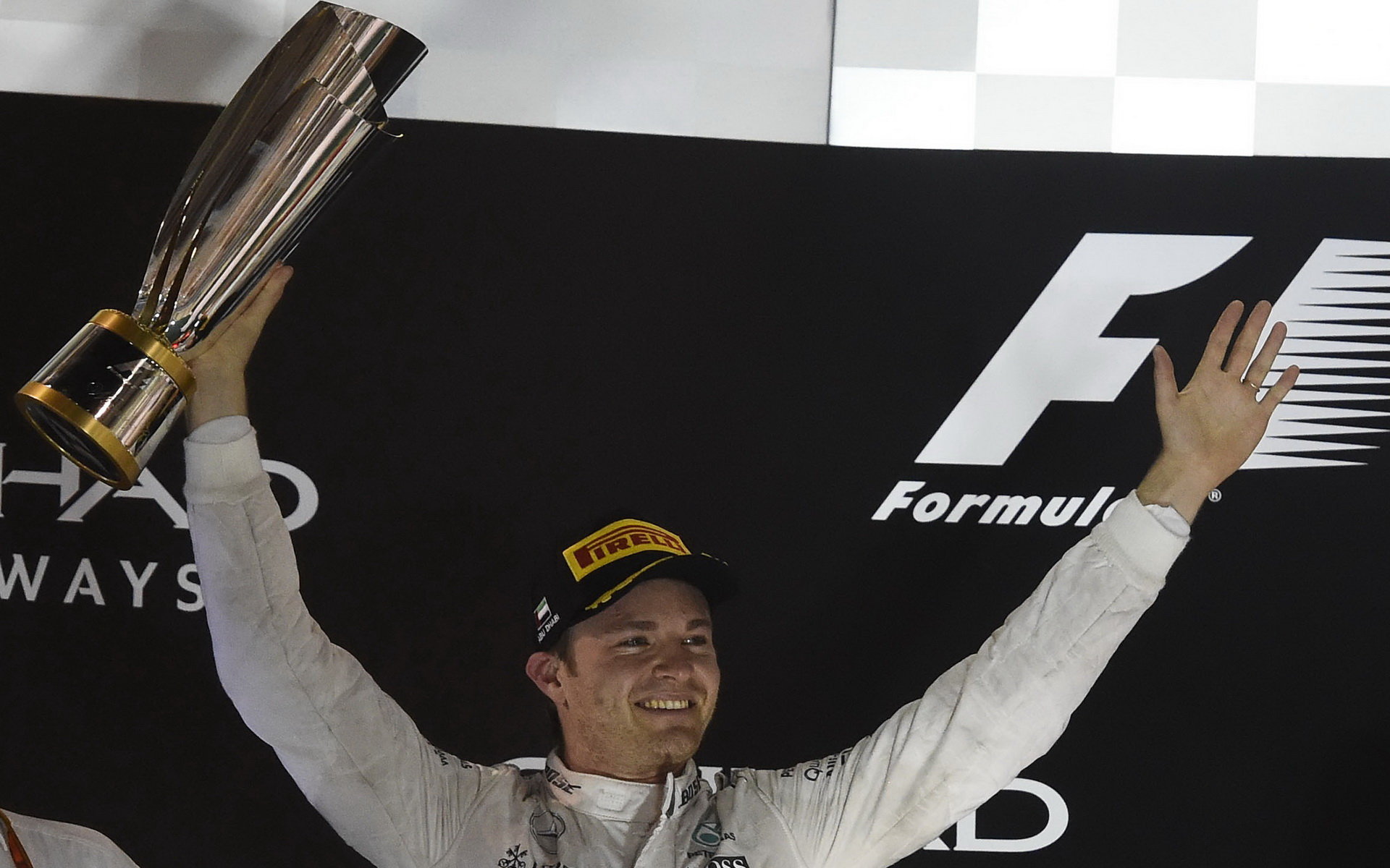 Nico Rosberg se raduje z mistrovského titulu po závodě v Abú Zabí