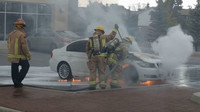 BMW v plamenech