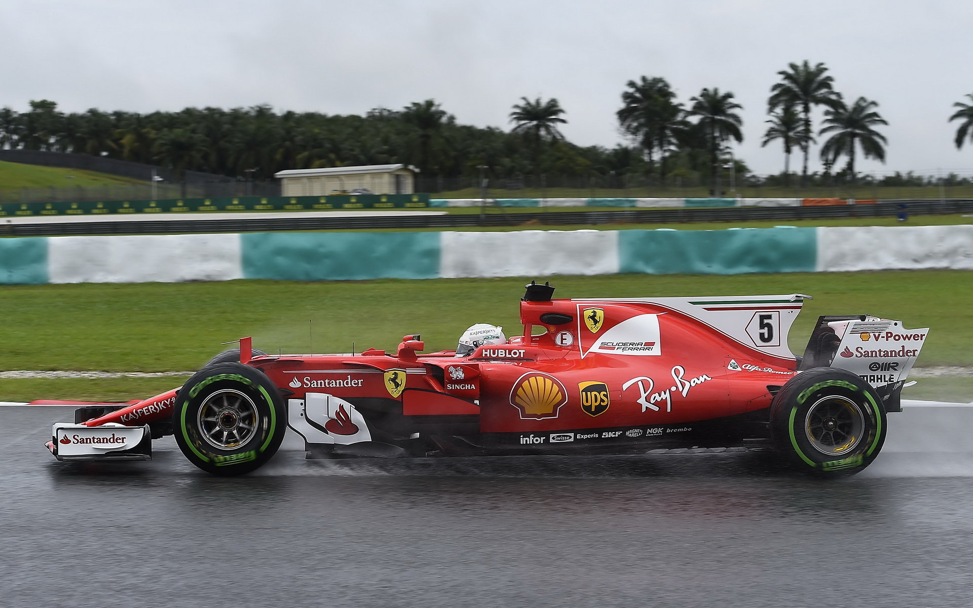 Sebastian Vettel za deštivého tréninku v Malajsii