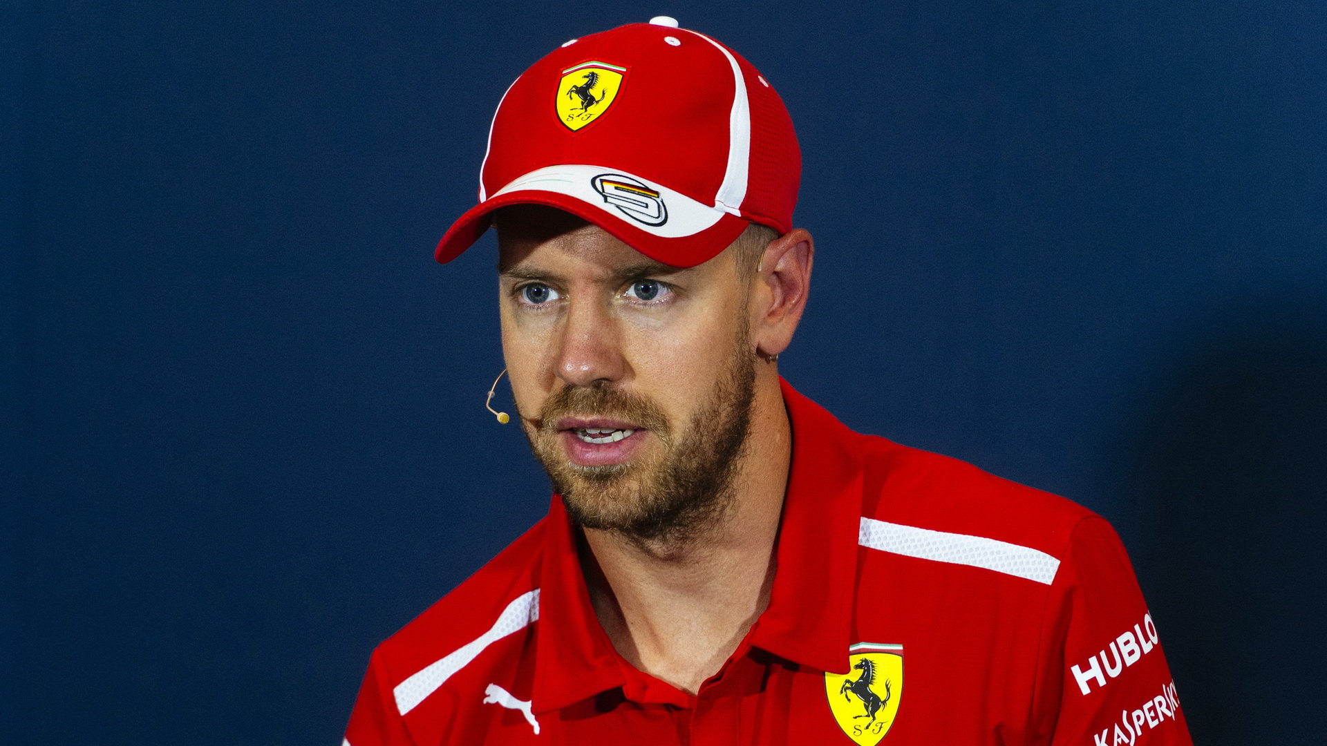 Sebastian Vettel na tiskovce v Monaku