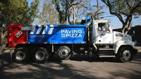 V zámoří se do oprav silnic pustila společnost Domino's Pizza