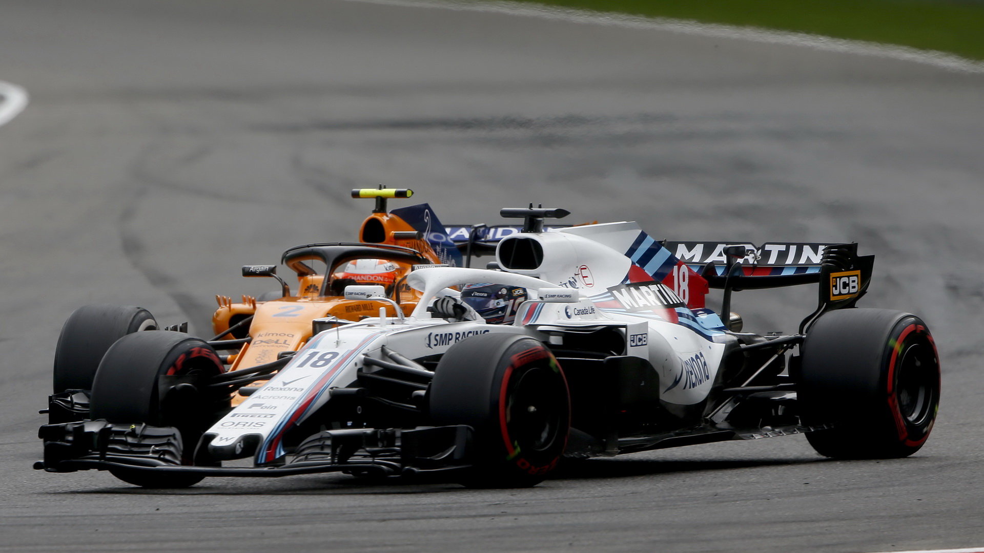 Lance Stroll a Stoffel Vandoorne v závodě v Belgii