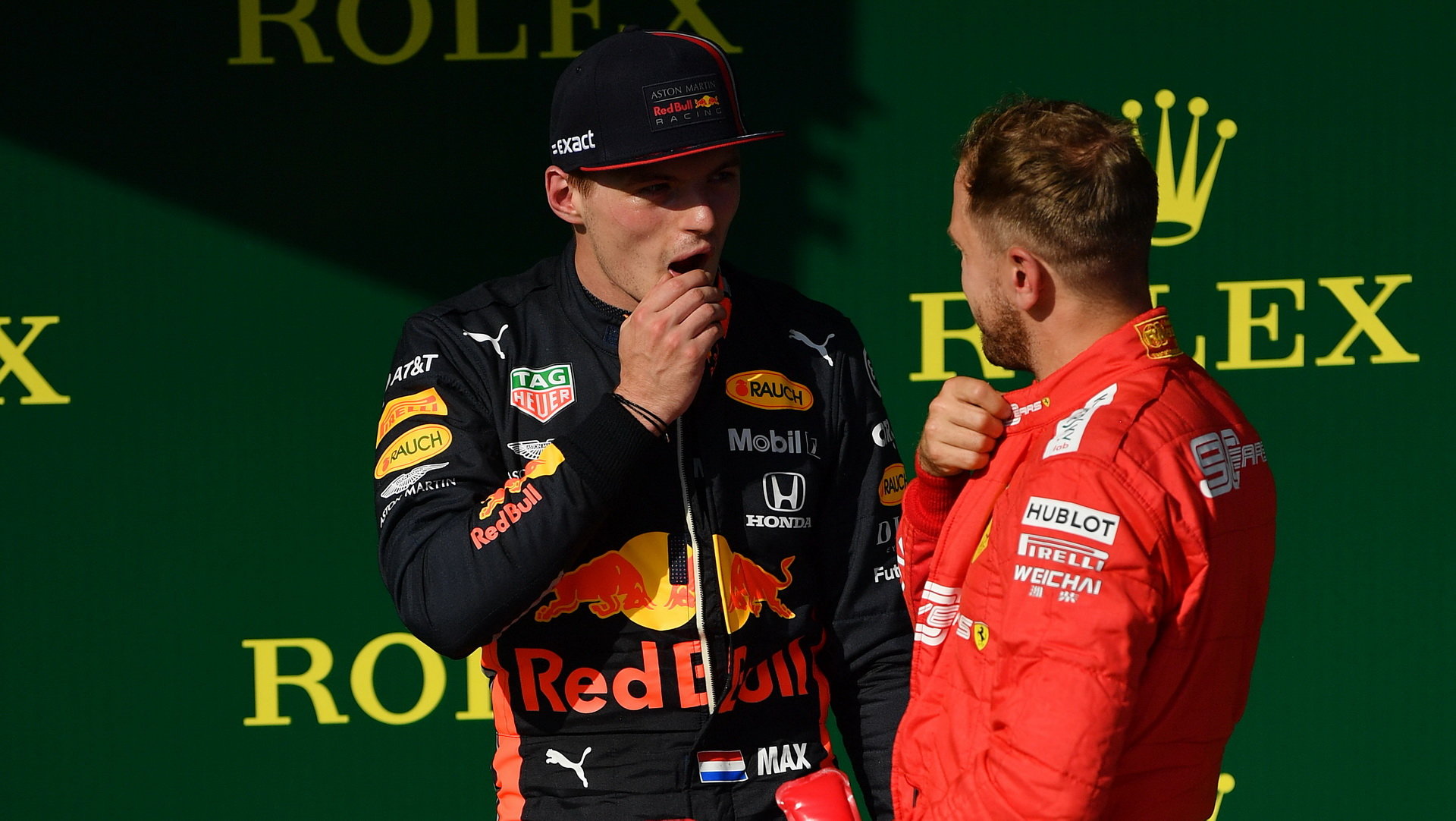 Max Verstappen a Sebastian Vettel po závodě v Maďarsku